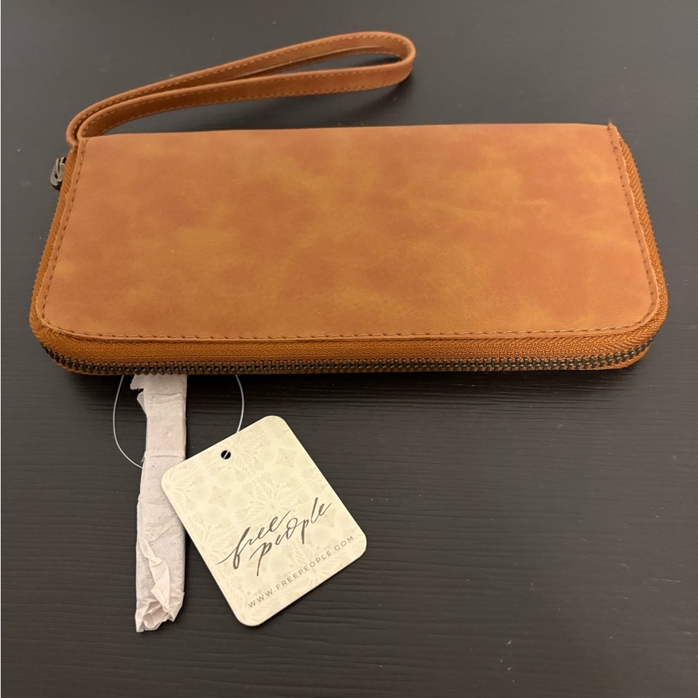 Free People distressed brown vegan leather wristlet. New with tags.